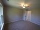 Bedroom featuring neutral walls, carpet, ceiling fan and closet at 109 Buckthorne Ln, Mooresville, IN 46158