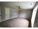 Bedroom featuring neutral walls, carpet, ceiling fan and closet door at 109 Buckthorne Ln, Mooresville, IN 46158