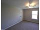 Bedroom featuring neutral walls, carpet, ceiling fan and a bright window at 109 Buckthorne Ln, Mooresville, IN 46158