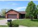Beautiful one-story home with brick accents, an attached garage, and an established lawn and landscaping at 109 Buckthorne Ln, Mooresville, IN 46158