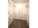 Spacious walk-in closet with built-in shelving and carpet at 109 Buckthorne Ln, Mooresville, IN 46158