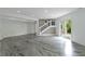 Finished basement with polished concrete floors and a walkout to the yard at 10919 Running Tide Ct, Indianapolis, IN 46236