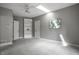 Bright bedroom boasts a skylight and built-in shelving at 10919 Running Tide Ct, Indianapolis, IN 46236