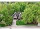 Charming home with a two-car garage, well-kept lawn, mature trees, and attractive landscaping, offering great curb appeal at 10919 Running Tide Ct, Indianapolis, IN 46236