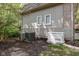 Exterior view with a generator and AC units, ensuring comfort and reliability during extreme weather conditions at 10919 Running Tide Ct, Indianapolis, IN 46236