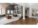 Cozy living room with built-in bookshelves, comfortable seating, and elegant decor at 10919 Running Tide Ct, Indianapolis, IN 46236