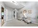 Stylish sitting room featuring soaring ceilings, neutral tones, large windows and modern decor at 10919 Running Tide Ct, Indianapolis, IN 46236