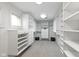 Spacious walk-in closet with custom shelving and ample storage, providing optimal organization at 10919 Running Tide Ct, Indianapolis, IN 46236