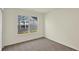 Carpeted bedroom with natural light from a window with exterior view at 110 Maxim Ct, Cumberland, IN 46229