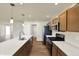 Well-appointed kitchen featuring an island with a sink, modern appliances, and ample cabinet space at 110 Maxim Ct, Cumberland, IN 46229