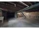 Spacious unfinished basement with concrete floor, exposed beams, and utility connections at 11212 Bayridge E Cir, Indianapolis, IN 46236