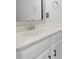 Modern bathroom with white vanity, sleek black hardware, minimalist mirror and stylish accessories at 11212 Bayridge E Cir, Indianapolis, IN 46236