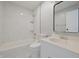 Updated bathroom with shower-tub combo, new vanity, and decorative mirror at 11212 Bayridge E Cir, Indianapolis, IN 46236