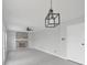 Open-concept living room features a brick fireplace, a ceiling fan, and neutral paint at 11212 Bayridge E Cir, Indianapolis, IN 46236