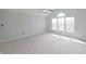 Large main bedroom with carpet flooring, ceiling fan, and vaulted ceiling at 11212 Bayridge E Cir, Indianapolis, IN 46236