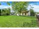 Expansive backyard with a healthy lawn, ideal for outdoor activities and relaxation at 1127 Jody Ct, Greenwood, IN 46143
