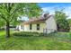 Lush backyard featuring a well-kept lawn, perfect for gardening and outdoor enjoyment at 1127 Jody Ct, Greenwood, IN 46143