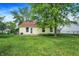 Well-maintained backyard with a lush green lawn and a charming single-story home at 1127 Jody Ct, Greenwood, IN 46143