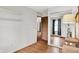 Bright bedroom features wood floors and a mirrored closet, offering plenty of space at 1127 Jody Ct, Greenwood, IN 46143
