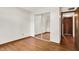 An empty room that features a mirrored closet and laminate floors at 1127 Jody Ct, Greenwood, IN 46143