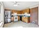 Bright kitchen featuring stainless steel appliances and light colored cabinets and countertops at 1127 Jody Ct, Greenwood, IN 46143