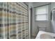 Bathroom featuring a vanity with a white sink and a shower with a patterned curtain at 12078 N 125 W, Alexandria, IN 46001