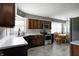 Kitchen with stainless steel appliances, wood cabinets and tile flooring at 12078 N 125 W, Alexandria, IN 46001