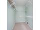 Spacious walk-in closet featuring white wire shelving for optimal storage and organization at 12698 Whisper Way, Fishers, IN 46037