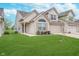 Well-maintained home with green lawn, attached two-car garage, and brick with vinyl siding at 12698 Whisper Way, Fishers, IN 46037