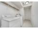 Laundry room featuring a washer, dryer, and wire shelving for convenient storage at 12698 Whisper Way, Fishers, IN 46037