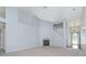 Large living room with carpet, fireplace, and lots of natural light open to the entrance and kitchen at 12698 Whisper Way, Fishers, IN 46037