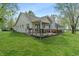Spacious backyard with a wooden deck and ample green space at 1285 S 1100 E, Zionsville, IN 46077
