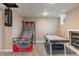 Finished basement featuring recreation area with air hockey, basketball hoop, and punching bag at 1285 S 1100 E, Zionsville, IN 46077