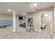 Finished basement with room to entertain and doorway to bedroom at 1285 S 1100 E, Zionsville, IN 46077