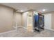 Finished basement with recreation space and access to the bathroom at 1285 S 1100 E, Zionsville, IN 46077