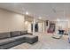 Finished basement featuring a sectional sofa and recreational space with a TV at 1285 S 1100 E, Zionsville, IN 46077