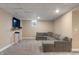 Finished basement offers a cozy living space with comfortable seating and natural light at 1285 S 1100 E, Zionsville, IN 46077