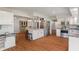 Spacious kitchen featuring an island with bar seating, stainless steel appliances, and ample cabinet space at 1285 S 1100 E, Zionsville, IN 46077