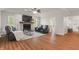 Spacious living room featuring a fireplace, wood floors, and an open layout perfect for entertaining at 1285 S 1100 E, Zionsville, IN 46077