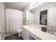 Bright bathroom featuring a large mirror and ample storage within the vanity and medicine cabinet at 13451 All American Rd, Fishers, IN 46037