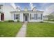 Charming single-story home with blue shutters and well-maintained front lawn at 13451 All American Rd, Fishers, IN 46037