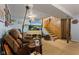 Basement with stairs, TV and comfortable seating for a cozy living space at 150 Church St, Mooresville, IN 46158