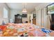 Bedroom featuring a large bed with colorful patchwork quilt and built in closet space at 150 Church St, Mooresville, IN 46158