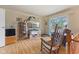 Cozy living room with hardwood floors and ample natural light from a large window at 150 Church St, Mooresville, IN 46158