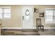 Bright entryway featuring a decorative door and modern flooring at 1509 S Spencer Ave, Indianapolis, IN 46203