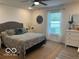 Cozy bedroom featuring a comfortable bed, neutral color palette, and ample natural light at 1511 Coen Ct, Columbus, IN 47201