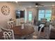 Inviting living space featuring a dining area, a cozy seating area, and large windows at 1511 Coen Ct, Columbus, IN 47201