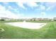 Scenic backyard view showcasing a tranquil pond with fountain and well-maintained lawns at 16201 Haywood St, Fishers, IN 46037