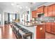 Modern kitchen featuring granite countertops, pendant lighting, and stainless steel appliances at 16201 Haywood St, Fishers, IN 46037