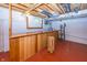 Basement with wooden bar and stools, perfect for entertaining at 1630 Hinson Rd, Martinsville, IN 46151